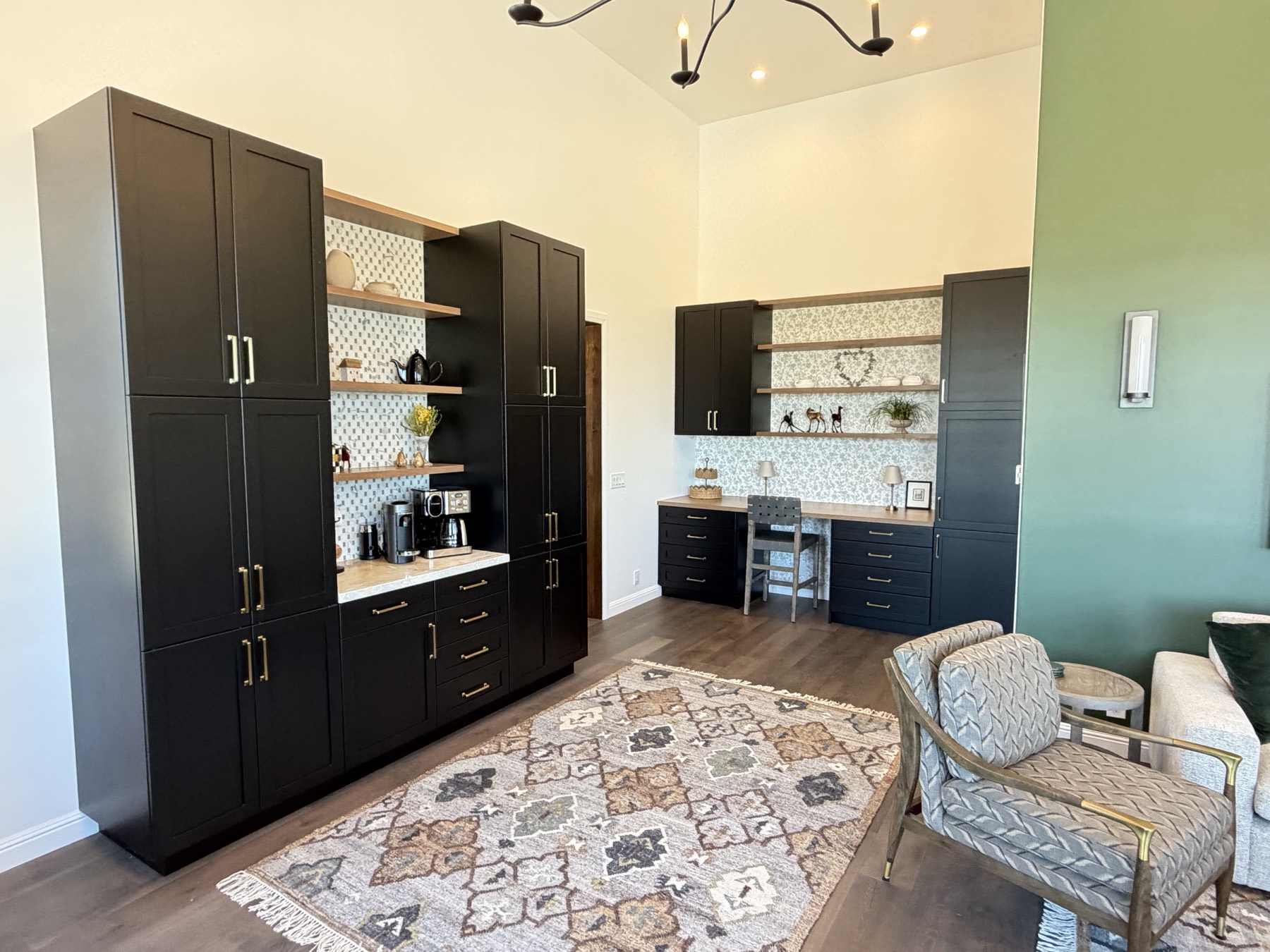 Butler's pantry with custom millwork and brass hardware