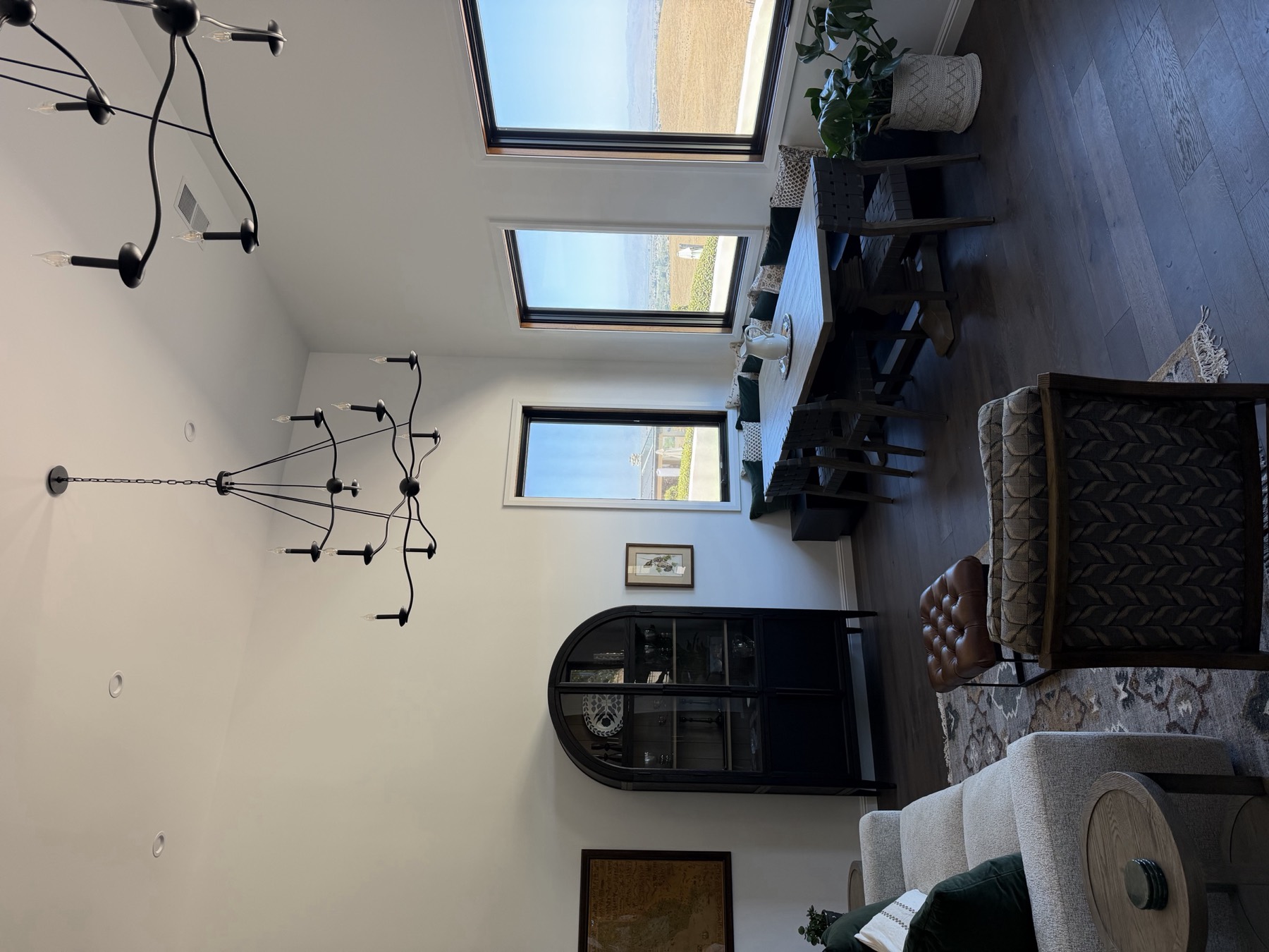 Custom home great room with vaulted ceiling and valley views