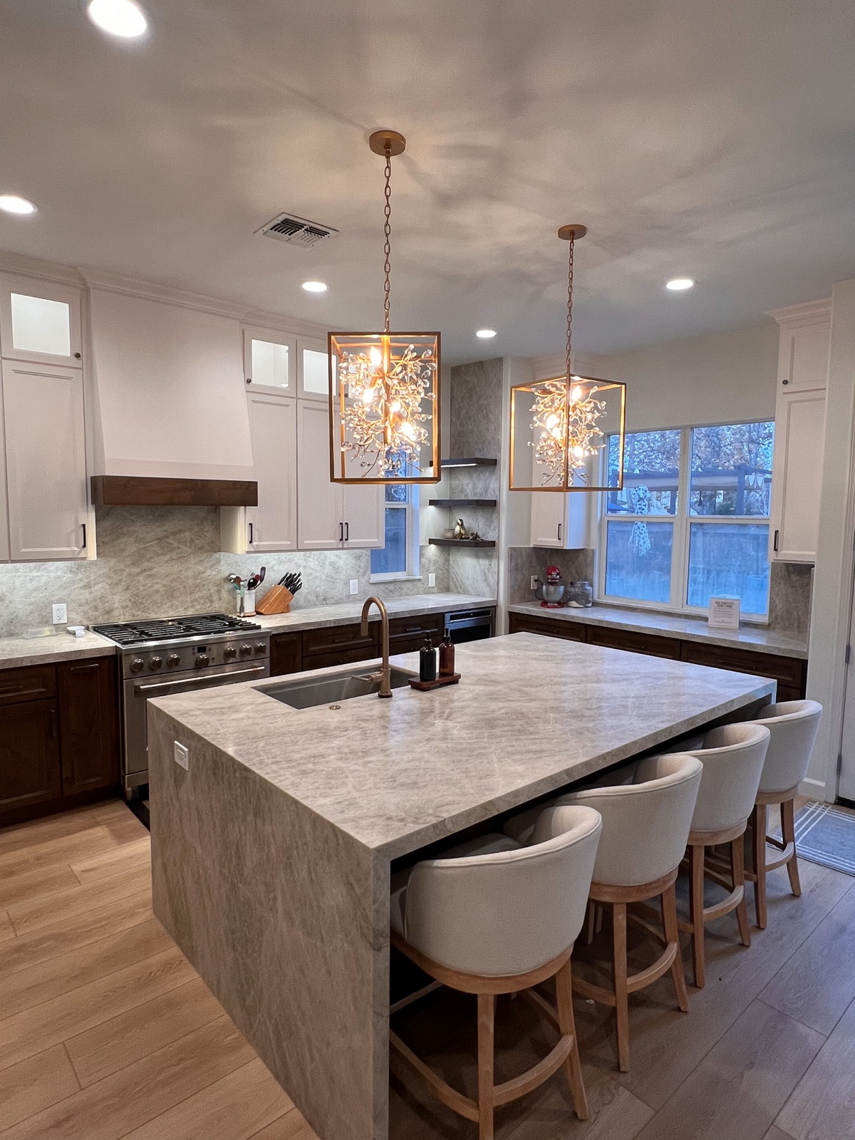 Elegant kitchen transformation with quartz waterfall countertops